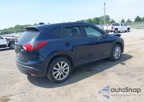 2015 Mazda Cx-5 Grand Touring z USA, uszkodzony, nr VIN JM3KE4DY0F0447686